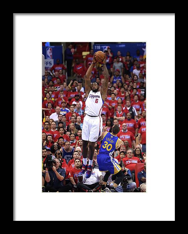 Playoffs Framed Print featuring the photograph Stephen Curry and Deandre Jordan by Stephen Dunn