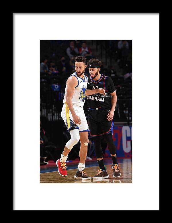 Nba Pro Basketball Framed Print featuring the photograph Stephen Curry and Seth Curry by David Dow