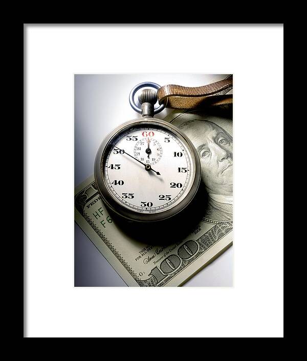 Two Objects Framed Print featuring the photograph Stopwatch Hundred Dollar Bill by ATU Images