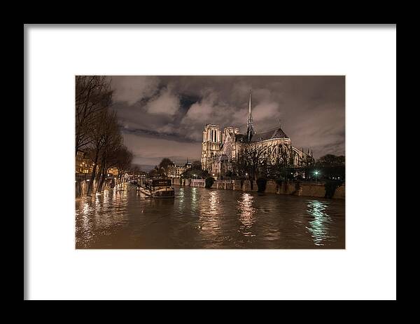 Notre Dame Framed Print featuring the photograph Stormy Notre-Dame by Linda Villers