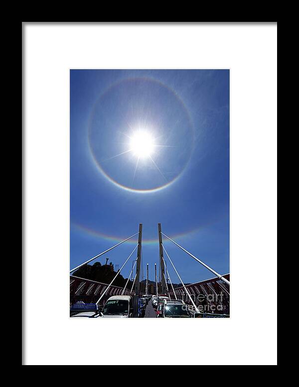 Spectacular Sky Framed Print featuring the photograph Sun halos above Puente Gemelo La Paz Bolivia by James Brunker