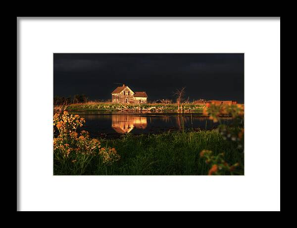 Farmstead Homestead Farm Lake Glowing Rain Shower Reflection Nd North Dakota Abandoned Ghost Forgotten Decay Storm Cloud Framed Print featuring the photograph Sun-Kissed Farmstead Reflections - Stensby homestead by Peter Herman