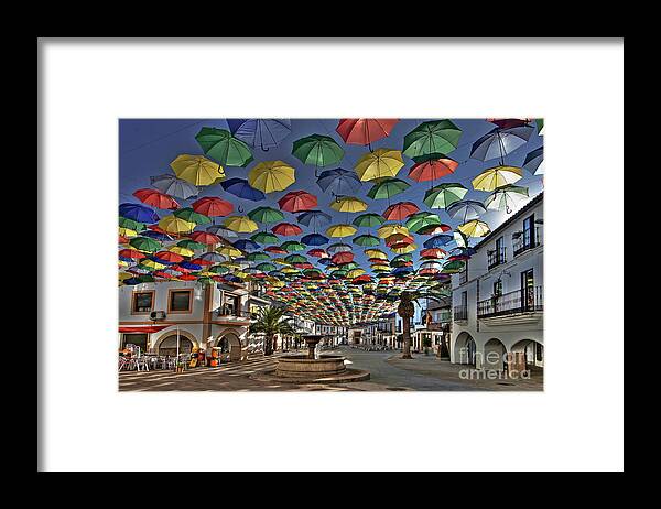 Umbrella Framed Print featuring the photograph Sun Shadow in Malpartida De Caceres - Spain by Paolo Signorini