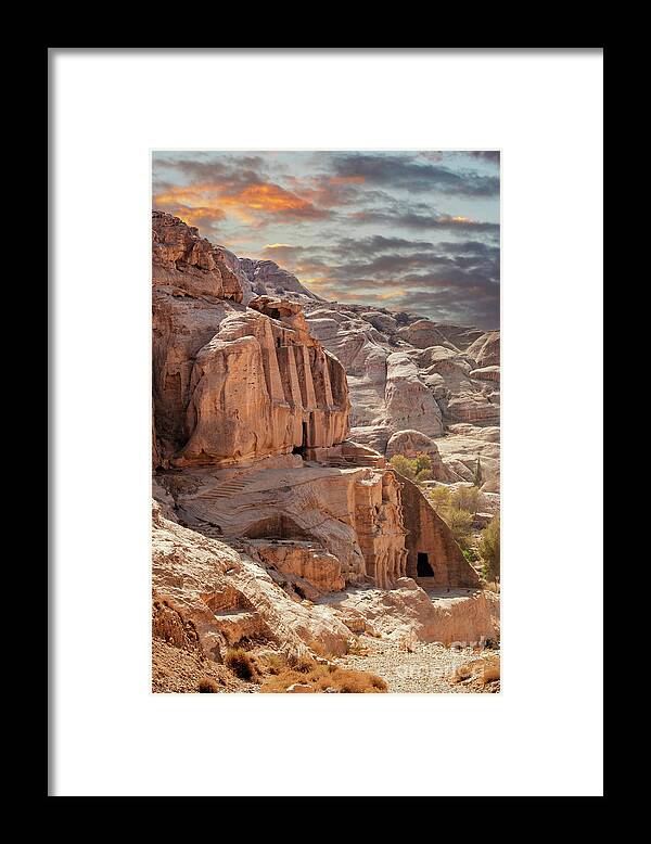 Petra Framed Print featuring the photograph Sunset at the lost city of Petra, Jordan. Amazing buildings are carved out of the pink rock and the Rose City dates to around 300 BC by Jane Rix