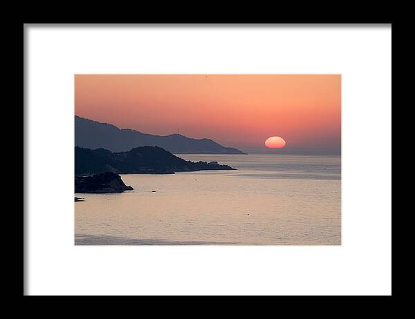 Scenics Framed Print featuring the photograph Sunset in the Aegean sea by George Pachantouris