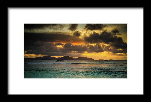 Background Framed Print featuring the photograph Sunset on Praslin Island by Jean-Luc Farges
