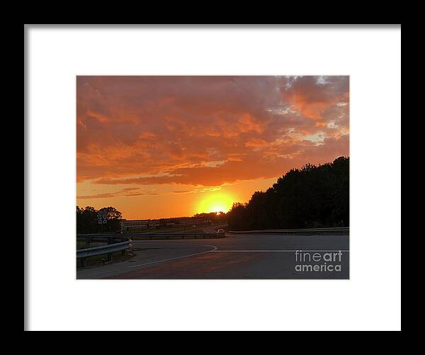 Sunset Framed Print featuring the photograph Sunset over Freeway by Catherine Wilson