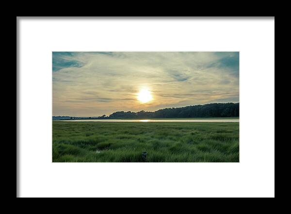 Sunset Over The Marsh Fields Framed Print featuring the photograph Sunset over the marsh fields by Christina McGoran