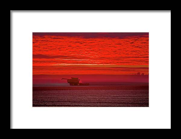 John Deere Framed Print featuring the photograph Sunset Soliloquy - John Deere combine harvesting soybeans at sunset by Peter Herman