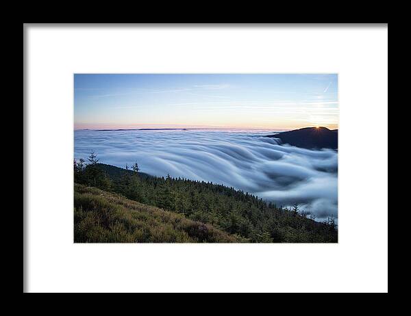 Courage Framed Print featuring the photograph Sunset with floating blue waves of clouds by Vaclav Sonnek