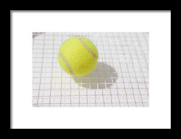 Tennis Framed Print featuring the photograph Tennis Ball and Racket by Hideki Yoshihara/Aflo