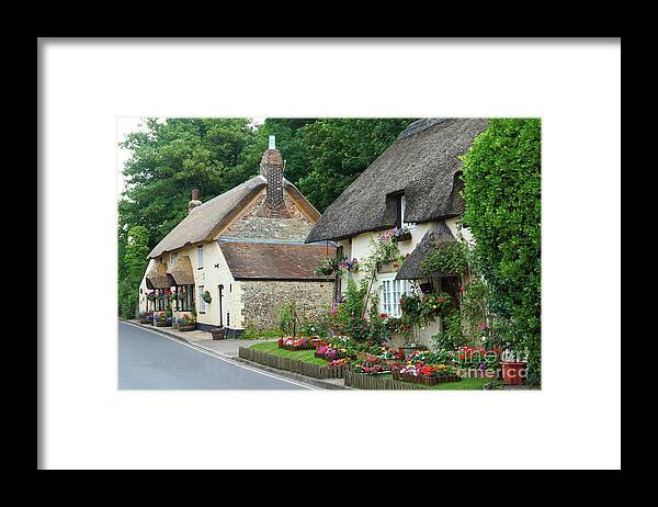 West Lulworth Framed Print featuring the photograph Thatched Cottages in Dorset by David Birchall