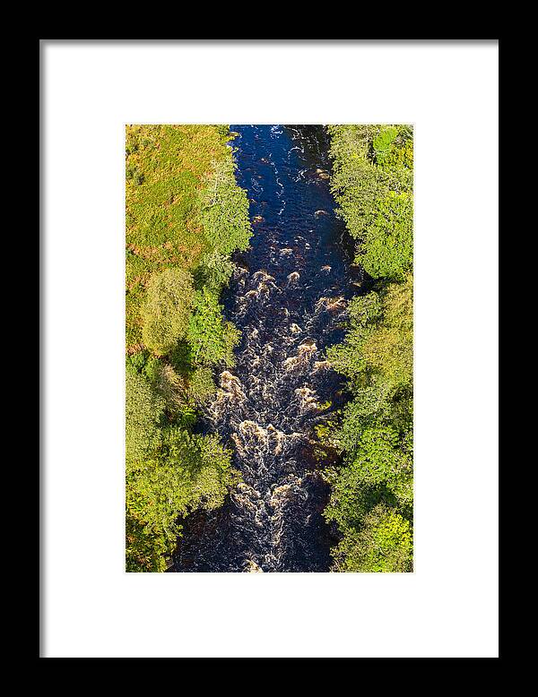 Scenics Framed Print featuring the photograph The aerial view looking straight down at a river in remote rural Dumfries and Galloway by JohnFScott