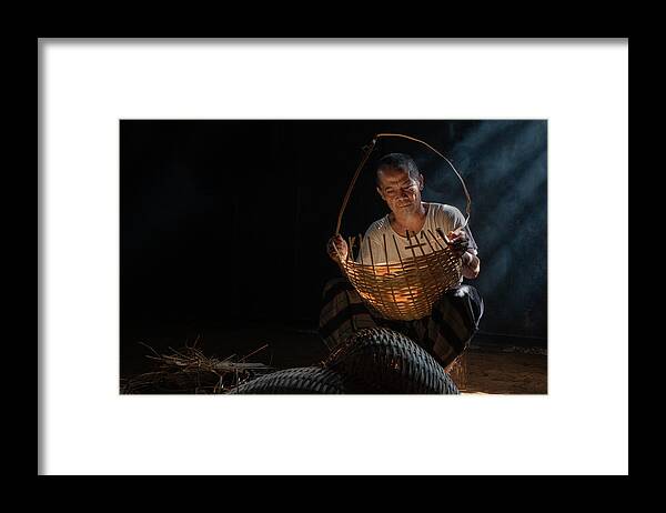 Man Framed Print featuring the photograph The basket weaver by Anges Van der Logt