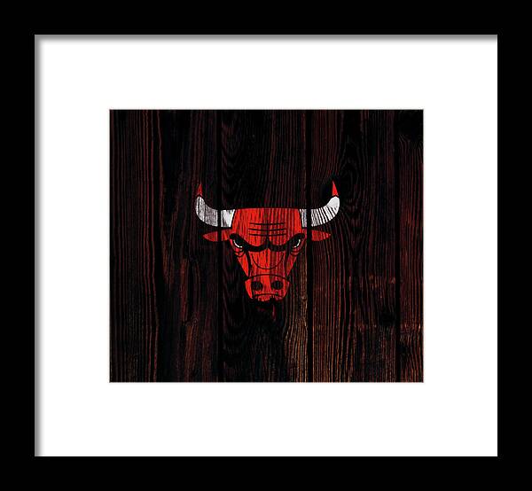 The Chicago Bulls Framed Print featuring the mixed media The Chicago Bulls by Brian Reaves