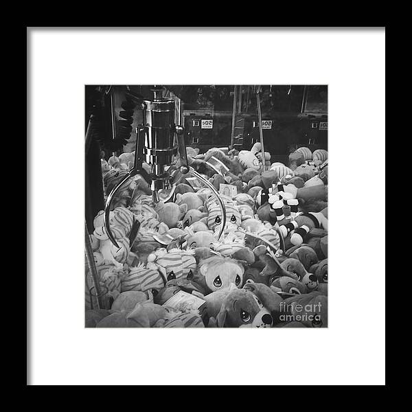 Claw Machine Framed Print featuring the photograph The Claw by Onedayoneimage Photography