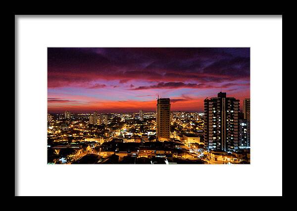 Scenics Framed Print featuring the photograph The colors of winter in a magnificent sunset over the city. by CRMacedonio
