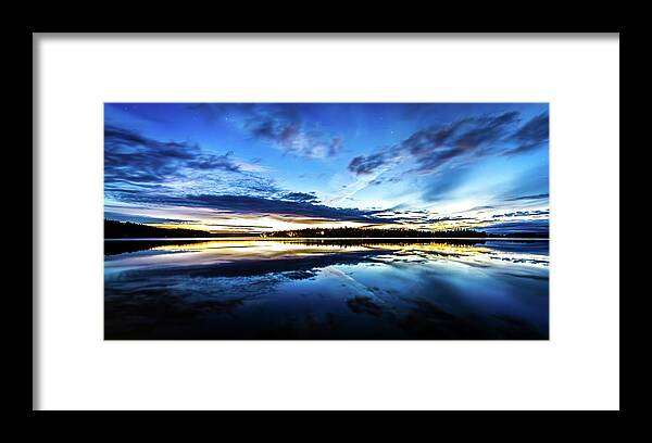 Kyle Lavey Photography Photographs Framed Print featuring the photograph The Dance of Day and Night Over Calm Waters by Kyle Lavey