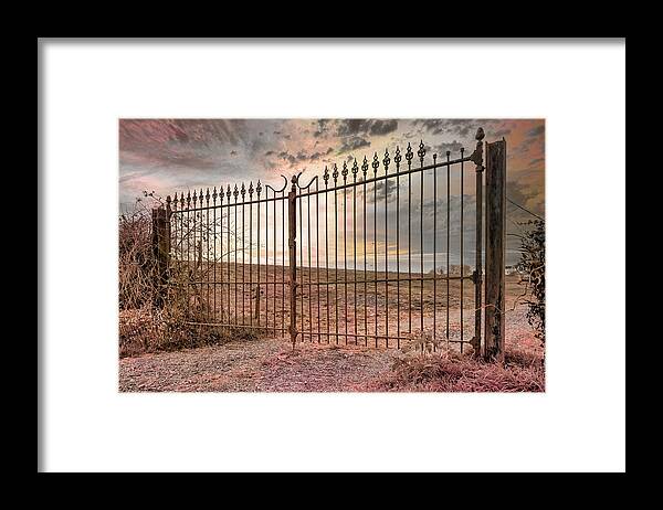 Gate Framed Print featuring the photograph The gate to another dimension by Yasmina Baggili