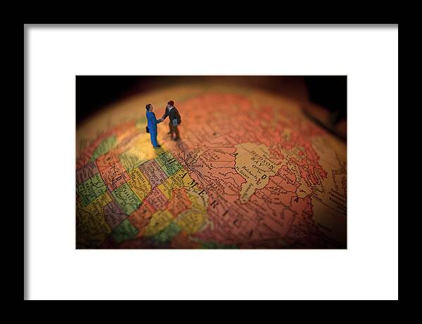 World Framed Print featuring the photograph The Handshake by Craig J Satterlee