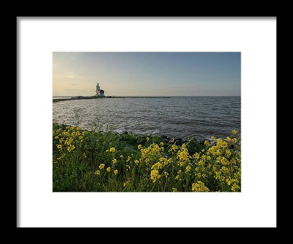 Lighthouse Framed Print featuring the photograph The Horse of Marken, a lighthouse on the east side of the small island of Marken in the Netherlands by Anges Van der Logt