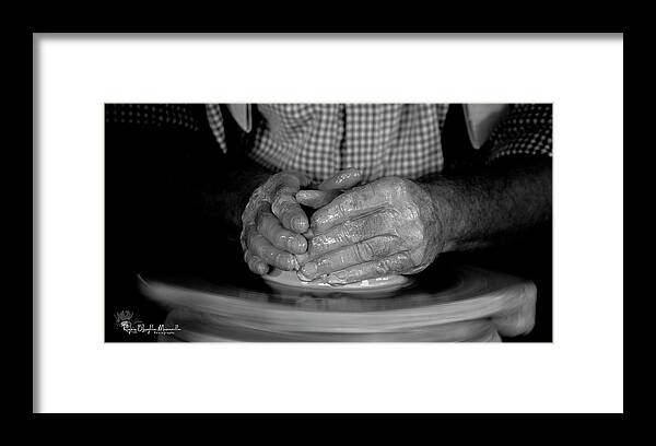 Black And White Framed Print featuring the photograph The Potter's Hands by Regina Muscarella