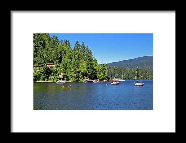Alex Lyubar Framed Print featuring the photograph The village on the slope of Deep Cove by Alex Lyubar