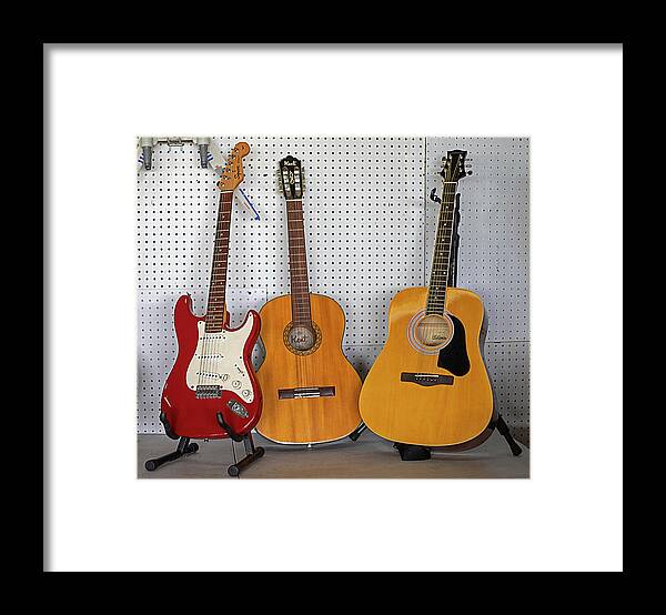 Guitar Framed Print featuring the photograph Three Guitars by Dart Humeston