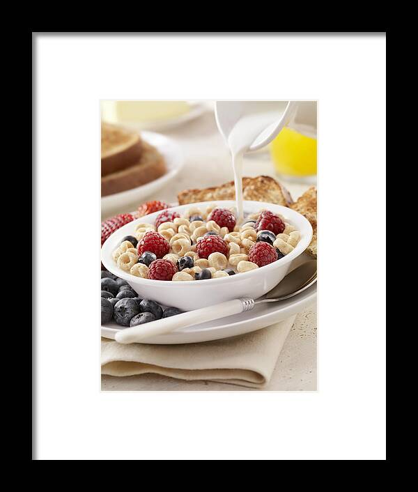 Concepts & Topics Framed Print featuring the photograph Toasted Oat Breakfast Cereal by LauriPatterson