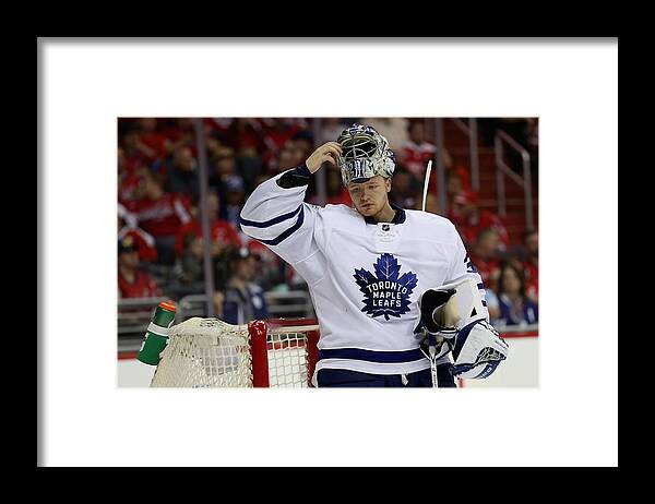 Playoffs Framed Print featuring the photograph Toronto Maple Leafs v Washington Capitals - Game Five by Rob Carr