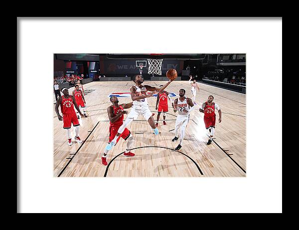 Mikal Bridges Framed Print featuring the photograph Toronto Raptors v Phoenix Suns by David Sherman