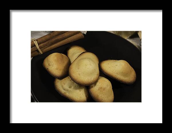 Madeleine Sponge Cake Framed Print featuring the photograph Traditional french pastry : Madeleine and cinnamon in a black plate by Jean-Marc PAYET