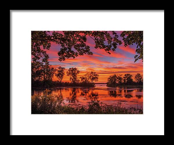 Tranquility Framed Print featuring the photograph Tranquility - fisherman on lake Waubesa at Babcock park with glorious sunset by Peter Herman