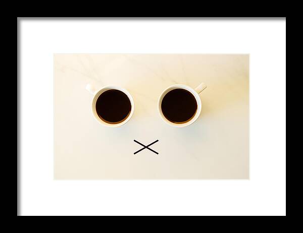 People Framed Print featuring the photograph Two cups of coffees arranged as human face with line showing emotion. dissatisfied by Janecocoa