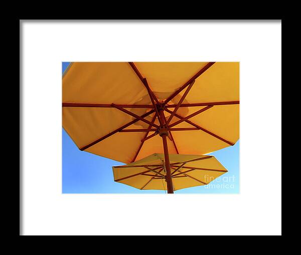 Umbrellas Framed Print featuring the photograph Umbrellas by Wendy Golden