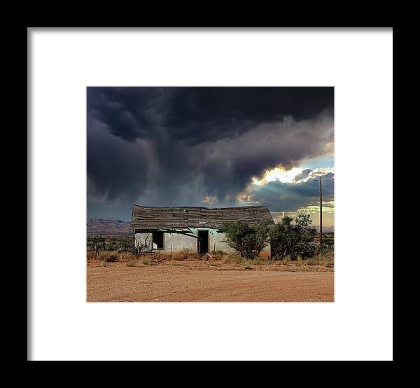 Clouds Framed Print featuring the photograph Under the Stormy Skies by Carmen Kern