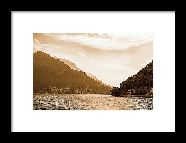  Promontory Framed Print featuring the photograph Unfurling Sepia Perspective of Lake Como by Brenda Kean