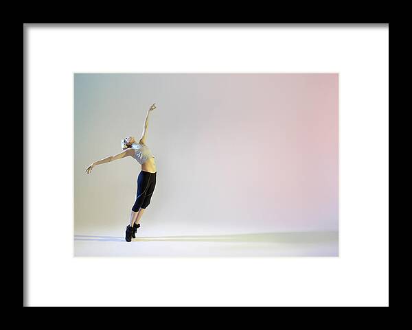 Ballet Dancer Framed Print featuring the photograph Urban Ballet Dancer In Graceful Pose by Tara Moore