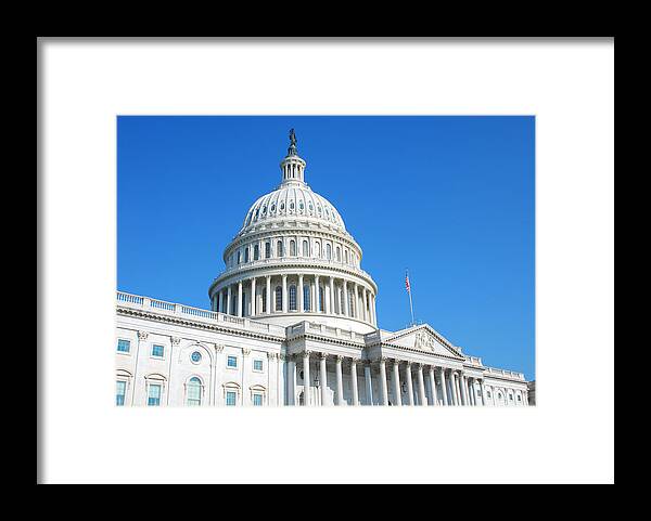 Democracy Framed Print featuring the photograph US Congress building in Washington DC and cloudless blue sky by Uschools