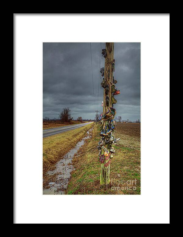 Travel Framed Print featuring the photograph Used Shoe Pole by Larry Braun