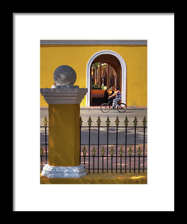 Valladolid Framed Print featuring the photograph Valladolid Colors - street scene with bicyclist and yellow architecture by Peter Herman