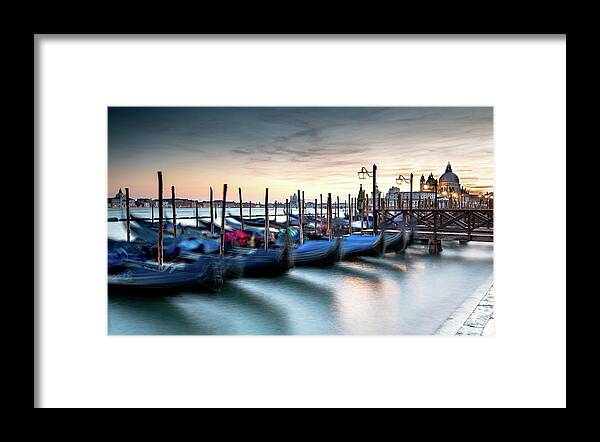 Gondola Framed Print featuring the photograph Venice Gondolas moored at the San Marco square. by Michalakis Ppalis