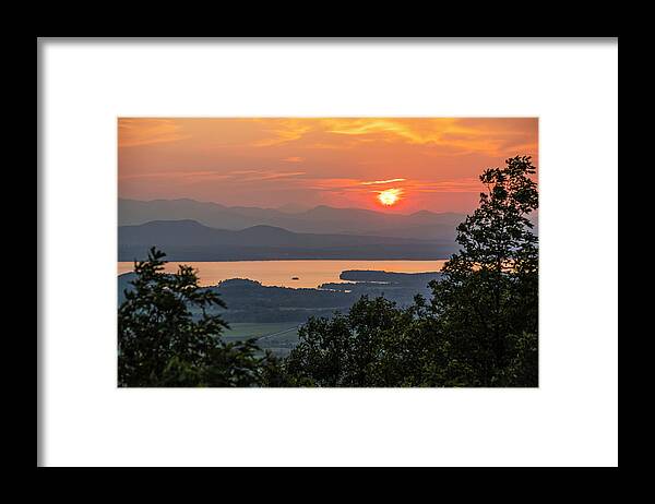 Adirondacks Framed Print featuring the photograph Vibrant sunset through trees Lake Champlain and the Adirondacks from Mount Philo Charlotte Vermont by Toby McGuire