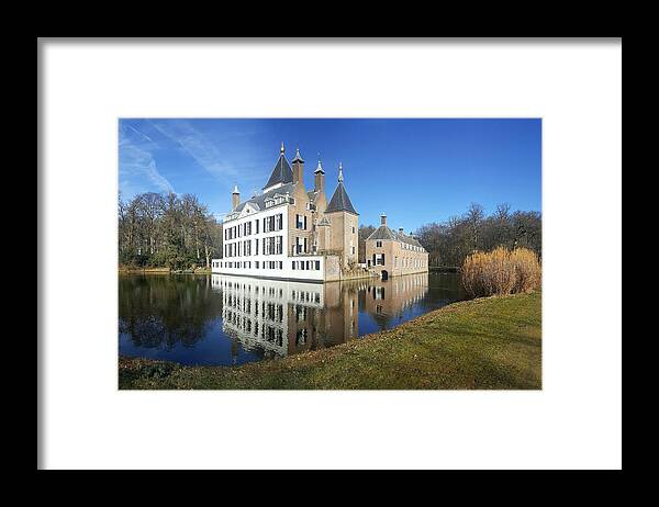 Scenics Framed Print featuring the photograph View of Renswoude Castle and lake, Netherlands by Frans Sellies