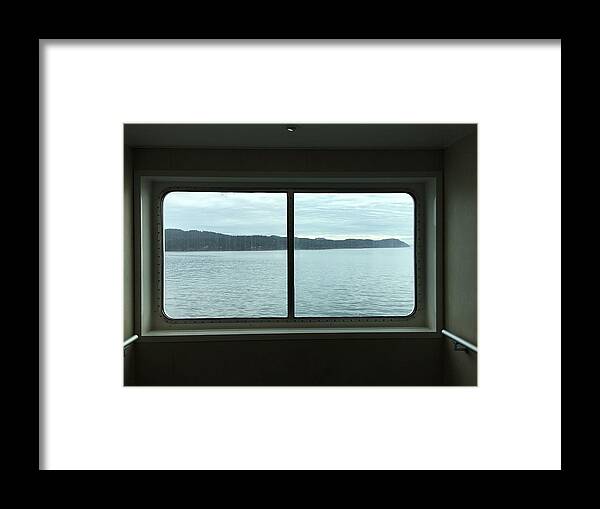 Tranquility Framed Print featuring the photograph View of sea from window by Olivija Stoilova / FOAP