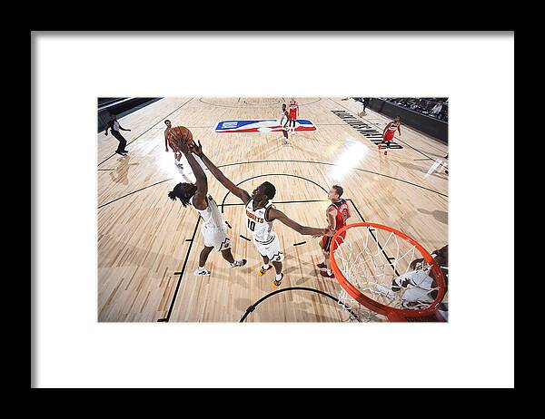Nba Pro Basketball Framed Print featuring the photograph Washington Wizards v Denver Nuggets by Garrett Ellwood