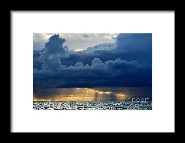 Storm Clouds Framed Print featuring the photograph Watching the Storm over the Water by fototaker Tony