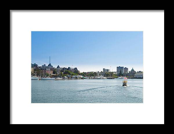 Small Framed Print featuring the photograph water taxi Victoria Harbor by David L Moore