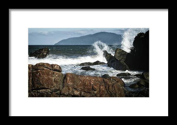 Rocks Framed Print featuring the photograph Waves against the rocks by Robert Bociaga