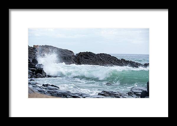 Waves Framed Print featuring the photograph Waves Breaking on a Rocky Shoreline by Mark Stout